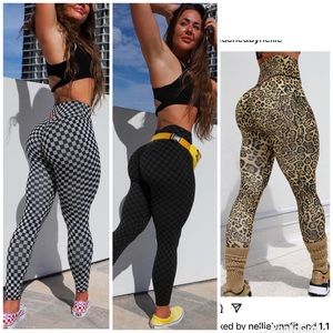 Peached by Nellie check me out /Animal print leggings Large